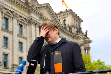 Maximilian Krah, member of the European Parliament for the far-right Alternative for Germany and AfD's top candidate in June's election to the assembly, gives a statement, after an aide has been arrested in Germany on suspicion of "especially severe" espionage for China, in Berlin, Germany, April 24, 2024.  
