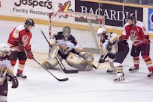 Cape Breton’s Marc-Andre Fleury, middle, waits for a shot at the top of the crease during a first-round playoff series against the Baie-Comeau Drakkar in March 2002. Cape Breton won the series in five games. CAPE BRETON POST FILE PHOTO