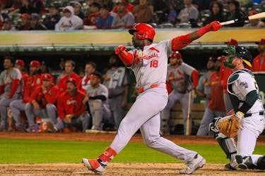 Apr 16, 2024; Oakland, California, USA; St. Louis Cardinals right fielder Jordan Walker (18) hits a sacrifice fly to score a run against the Oakland Athletics during the sixth inning at Oakland-Alameda County Coliseum. Mandatory Credit: Kelley L Cox-USA TODAY Sports/File Photo