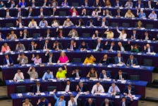 Members of the EU Parliament vote during a plenary session at the European Parliament in Starsbourg, France June 13, 2023.