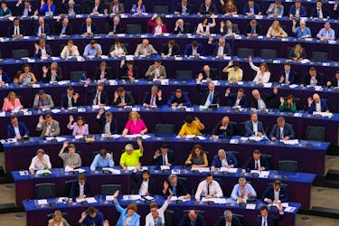 Members of the EU Parliament vote during a plenary session at the European Parliament in Starsbourg, France June 13, 2023.
