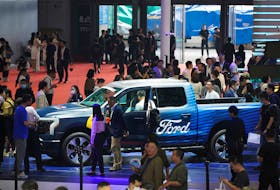 People visit a Ford booth at the Auto Shanghai show, in Shanghai, China April 18, 2023.