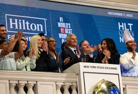 Christopher Nassetta, CEO of Hilton Worldwide, rings the opening bell at the New York Stock Exchange (NYSE) in New York City, U.S., December 7, 2023. 