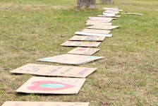 Signs made by P.E.I. students for an Earth Day demonstration in 2023 are lined up at Colonel Gray High School. Guardian file