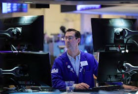 A trader works on the trading floor at the New York Stock Exchange (NYSE) in New York City, U.S., April 5, 2024.