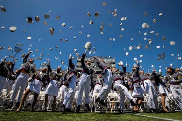 Graduating cadets toss their hats into the air at the end of the 2023 graduation ceremony at the United States Military Academy (USMA) at West Point, New York, U.S., May 27, 2023.