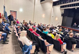 Dozens of people gathered in an auditorium at Colonel Grey High School on April 24 to listen and to discuss the risks associated with the privatization of health care in P.E.I. Vivian Ulinwa • SaltWire