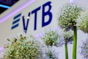 The logo of VTB bank is seen behind plants at the St. Petersburg International Economic Forum (SPIEF) in Saint Petersburg, Russia June 15, 2022.