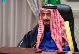 Saudi King Salman bin Abdulaziz addresses the kingdom's advisory Shura Council from his royal palace in Neom, Saudi Arabia, December 29, 2021, Saudi Press Agency/Handout via