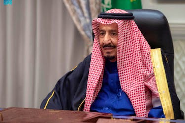 Saudi King Salman bin Abdulaziz addresses the kingdom's advisory Shura Council from his royal palace in Neom, Saudi Arabia, December 29, 2021, Saudi Press Agency/Handout via