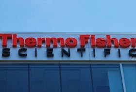 A sign marks the offices of Thermo Fisher Scientific offices in Waltham, Massachusetts, U.S., August 2, 2023.