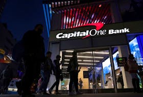 Signage is seen outside a Capital One Bank in Manhattan, New York, U.S., November 12, 2021.
