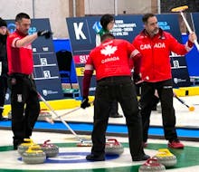 Team Canada members, from left, Peter Burgess, Martin Gavin and Kris Granchelli acknowledge a shot by skip Paul Flemming during action at the world senior men's curling championship in Ostersund, Sweden. The Halifax rink advanced to Friday's quarter-finals. - Curling Canada