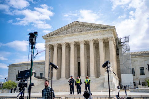 Members of the media set up outside the U.S. Supreme Court as the justices hear arguments on former President Trump’s claim of presidential immunity over criminal charges over his efforts to overturn the 2020 presidential election results in Washington, U.S., April 25, 2024.