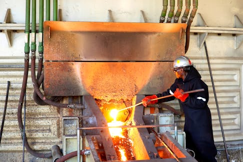 A worker attends to machinery at a smelter plant at Anglo American Platinum's Unki mine in Shurugwi, Zimbabwe, May 16, 2019.