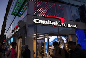 Signage is seen outside a Capital One Bank in Manhattan, New York, U.S., November 12, 2021.