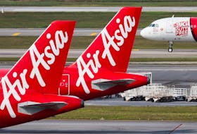 Planes from AirAsia, a subsidiary airline of Capital A, are seen on the tarmac of Kuala Lumpur International Airport Terminal 2 (KLIA2) in Sepang, Malaysia, February 26, 2024.