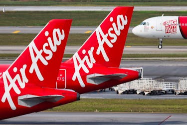 Planes from AirAsia, a subsidiary airline of Capital A, are seen on the tarmac of Kuala Lumpur International Airport Terminal 2 (KLIA2) in Sepang, Malaysia, February 26, 2024.