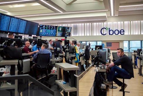 Brokers execute trades on the CBOE (Chicago Board Options Exchange) Global Markets  trading floor, at their headquarters in Chicago, Illinois, U.S., April 11, 2024.