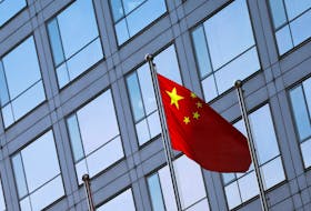 A Chinese flag flutters outside the China Securities Regulatory Commission (CSRC) building on the Financial Street in Beijing, China February 8, 2024.