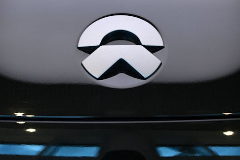 The logo of NIO seen on an ET7 car model is pictured at the NIO House, the showroom of the Chinese premium smart electric vehicle manufacture NIO Inc. in Berlin, Germany August 17, 2023.