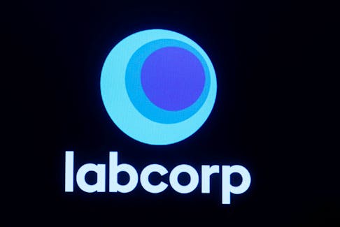 The logo for Labcorp, Laboratory Corporation of America, a life sciences company is displayed on a screen on the floor of the New York Stock Exchange (NYSE) in New York City, U.S., June 22, 2023. 