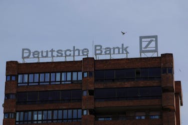 The logo of Deutsche Bank is seen on the roof of a building outside a Deutsche Bank branch office in Malaga, Spain, April 24, 2024.
