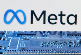 Meta logo is seen near computer motherboard in this illustration taken January 8, 2024.