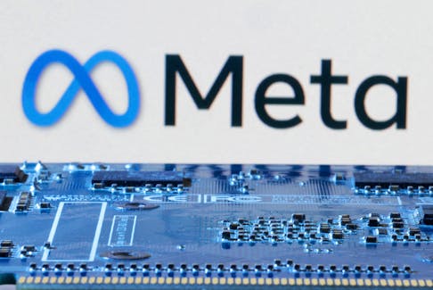 Meta logo is seen near computer motherboard in this illustration taken January 8, 2024.