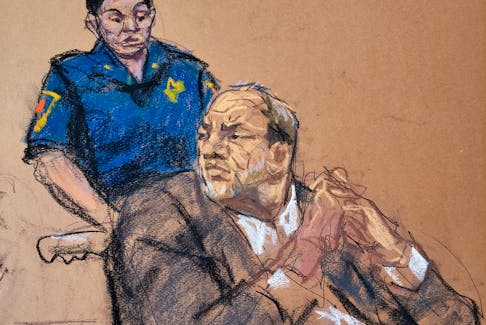Harvey Weinstein watches as Jessica Mann makes a statement during the sentencing following his conviction on sexual assault and rape charges in the Manhattan borough of New York City, New York, U.S. March 11, 2020 in this courtroom sketch.