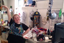 Marie Webb strikes a pose in her studio at The Blue Building Gallery off Maynard Street