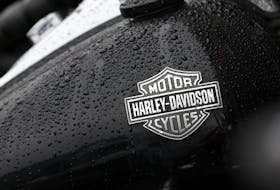 The logo of Harley-Davidson is seen on a motorcycle at a dealership in Queens, New York City, U.S., February 7, 2022.