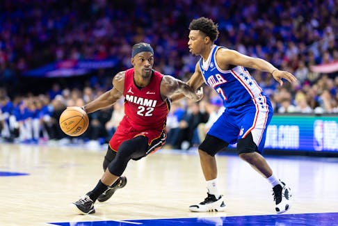 Apr 17, 2024; Philadelphia, Pennsylvania, USA; Miami Heat forward Jimmy Butler (22) dribbles the ball past Philadelphia 76ers guard Kyle Lowry (7) during the second quarter of a play-in game of the 2024 NBA playoffs at Wells Fargo Center. Mandatory Credit: Bill Streicher-USA TODAY Sports/File Photo
