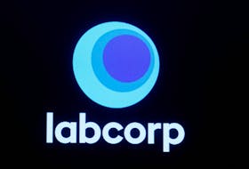 The logo for Labcorp, Laboratory Corporation of America, a life sciences company is displayed on a screen on the floor of the New York Stock Exchange (NYSE) in New York City, U.S., June 22, 2023. 