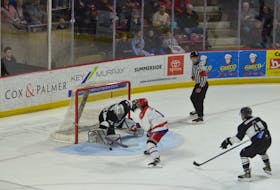 Miramichi Timberwolves goaltender Jack Flanagan stops Summerside D. Alex MacDonald Ford Western Capitals forward Trent Crane, 11, on this first-period scoring opportunity at the Island Petroleum Energy Centre on April 24. Miramichi defenceman Zachary Aprea-Ricard, 4, hustles back while referee Tanner Doiron follows the play. Flanagan’s goaltending played a big role in the Timberwolves’ 4-3 come-from-behind win. Miramichi now leads in the best-of-seven Maritime Junior Hockey League (MHL) final series 2-1. Jason Simmonds • The Guardian