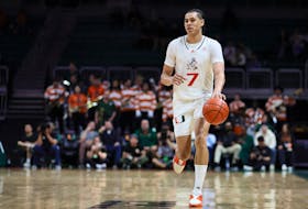 Jan 3, 2024; Coral Gables, Florida, USA; Miami Hurricanes guard Kyshawn George (7) dribbles the basketball against the Clemson Tigers during the second half at Watsco Center. Mandatory Credit: Sam Navarro-USA TODAY Sports/File Photo
