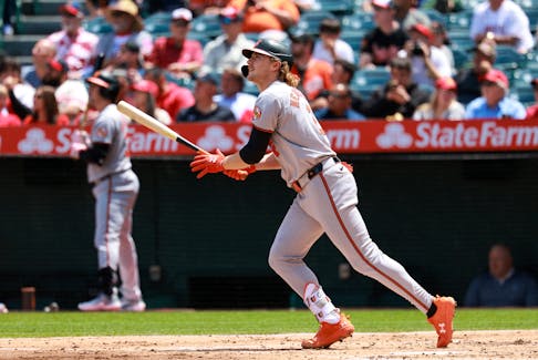 Apr 24, 2024; Anaheim, California, USA;  Baltimore Orioles shortstop Gunnar Henderson (2) hits a home run during the third inning against the Los Angeles Angels at Angel Stadium. Mandatory Credit: Kiyoshi Mio-USA TODAY Sports