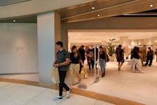 Shoppers leave a Zara store the day of its opening after fashion giant Inditex resumed its operations in Venezuela under a franchise agreement, in Caracas, Venezuela April 25, 2024.