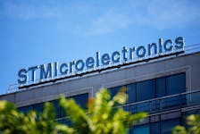 The logo of electronics and semiconductors manufacturer STMIcroelectronics is seen outside a company building in Montrouge, near Paris, France, July 12, 2022.