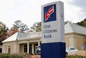 The First Citizens Bank logo adorns a sign at a branch of the regional bank, which is headquartered in North Carolina, in Chapel Hill, North Carolina, U.S., March 28, 2023.  