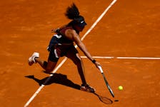 Tennis - WTA 1000 - Madrid Open - Park Manzanares, Madrid, Spain - April 24, 2024 Japan's Naomi Osaka in action during her round of 128 match against Belgium's Greet Minnen