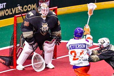 Albany FireWolves netminder Doug Jamieson stares down Halifax Thunderbirds forward Clarke Petterson during a National Lacrosse League game Jan. 6 in Albany, N.Y. The two teams will face each other in a one game quarter-final on Sunday. - National Lacrosse League