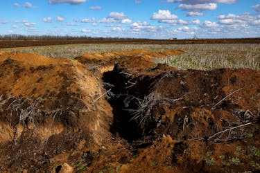 A trench is seen in the field of grain farmer Oleksandr Klepach, amid Russia's invasion of Ukraine, in Snihurivka, southeast Ukraine, February 20, 2023.