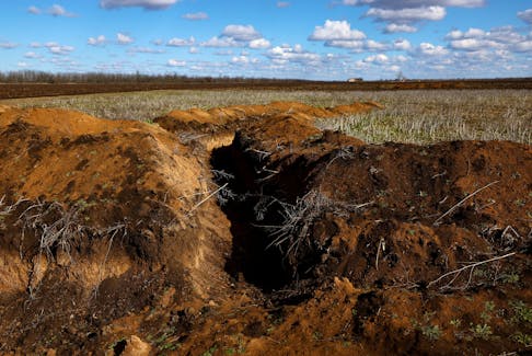 A trench is seen in the field of grain farmer Oleksandr Klepach, amid Russia's invasion of Ukraine, in Snihurivka, southeast Ukraine, February 20, 2023.