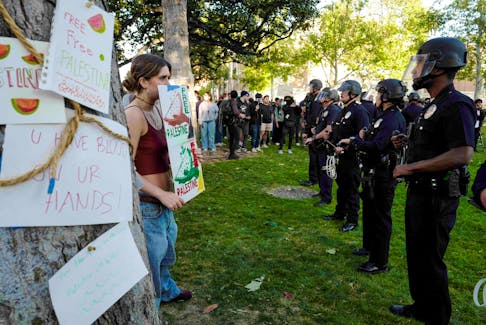 LAPD surrounds students protesting in support of Palestinians at an encampment at the University of Southern California’s Alumni Park, as the conflict between Israel and the Palestinian Islamist group Hamas continues, in Los Angeles, California, U.S., April 24, 2024. 