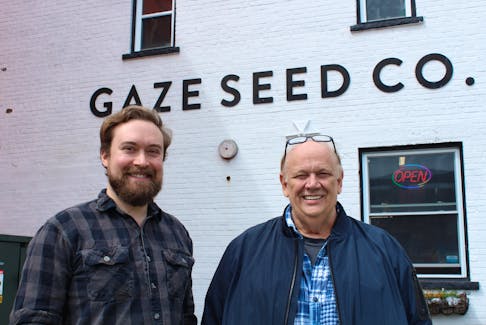 Jackson McLean, manager, and owner Peter Byrne of The Seed Company in St. John's. Next April marks 100 years in business for the company, though the pair have already begun ringing in the occasion and hope to have some sales and contests soon. Cameron Kilfoy/The Telegram
