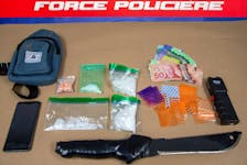 A 26-year-old Fredericton man was arrested and charged after fleeing police and being caught with around $13,000 worth of methamphetamine and fentanyl, alongside cash, a taser and a machete. Contributed