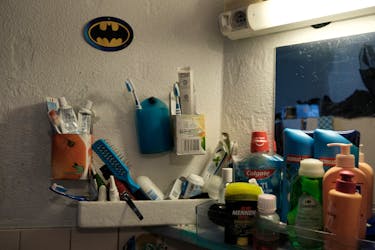 Toothbrushes and toiletries are seen in a cell shared by three people in the Villepinte detention centre in Villepinte, near Paris, France, April 8, 2024.