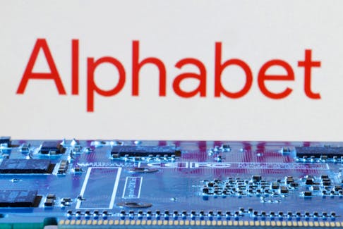 Alphabet logo is seen near computer motherboard in this illustration taken January 8, 2024.