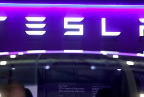 The logo of Tesla on display at the Everything Electric exhibition at the ExCeL London international exhibition and convention centre in London, Britain, March 28, 2024. 